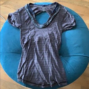 Keyhole-back tee.